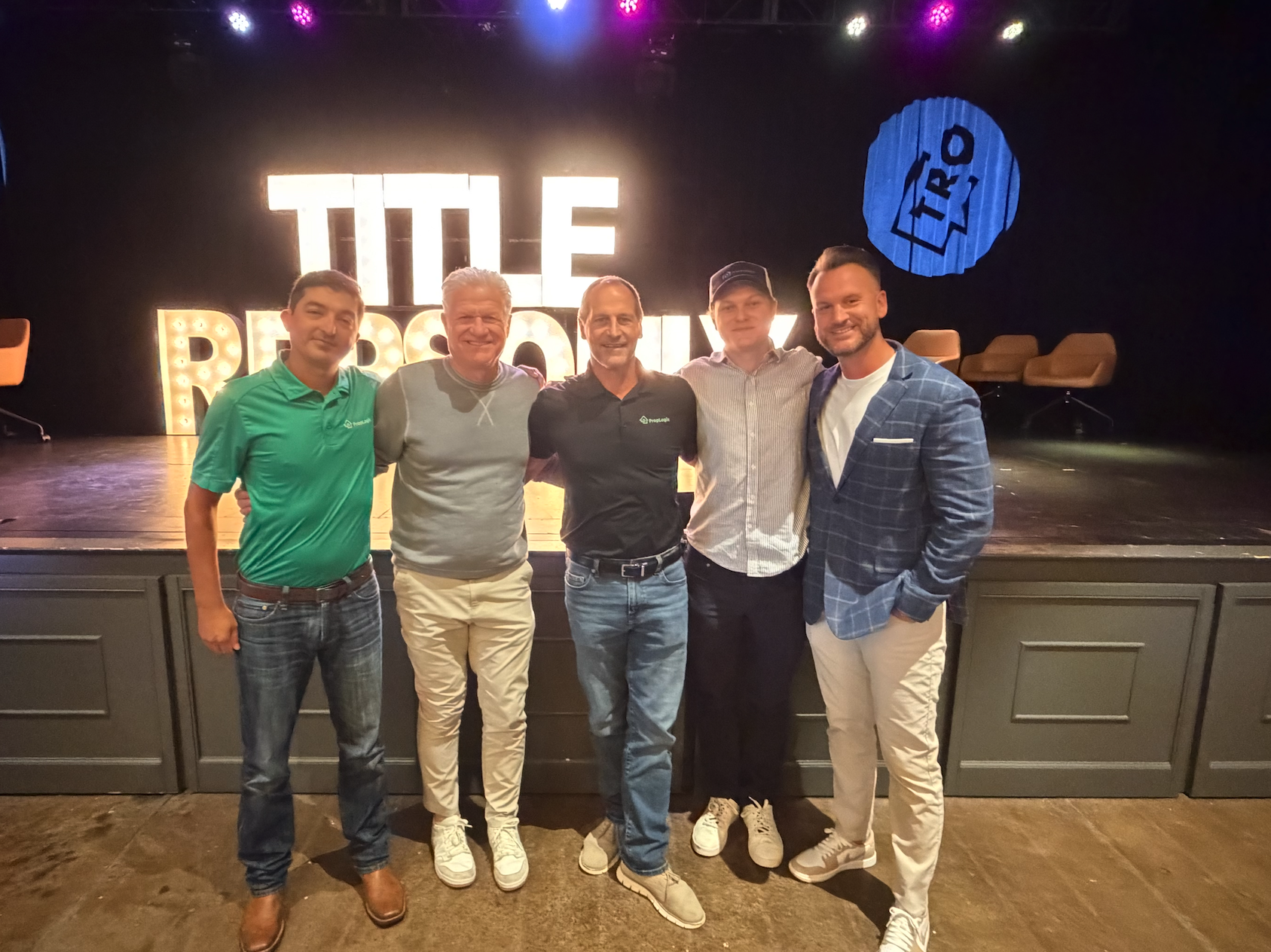 AgentBrief team on stage at the Title Resources event